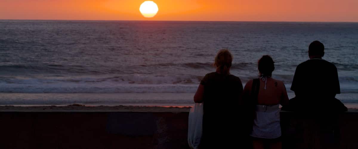 Pacific Beach Park which includes a beach, a sunset and landscape views