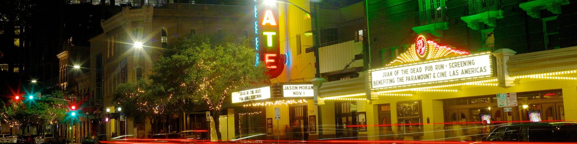 Paramount Theater which includes street scenes, a city and signage
