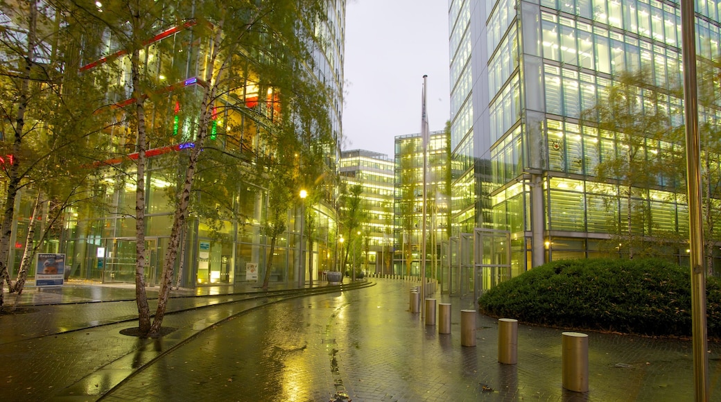 Potsdamer Platz which includes modern architecture and a city