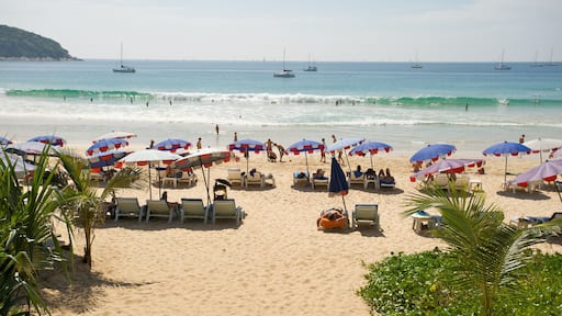 Praia de Nai Harn caracterizando natação, uma praia e paisagem