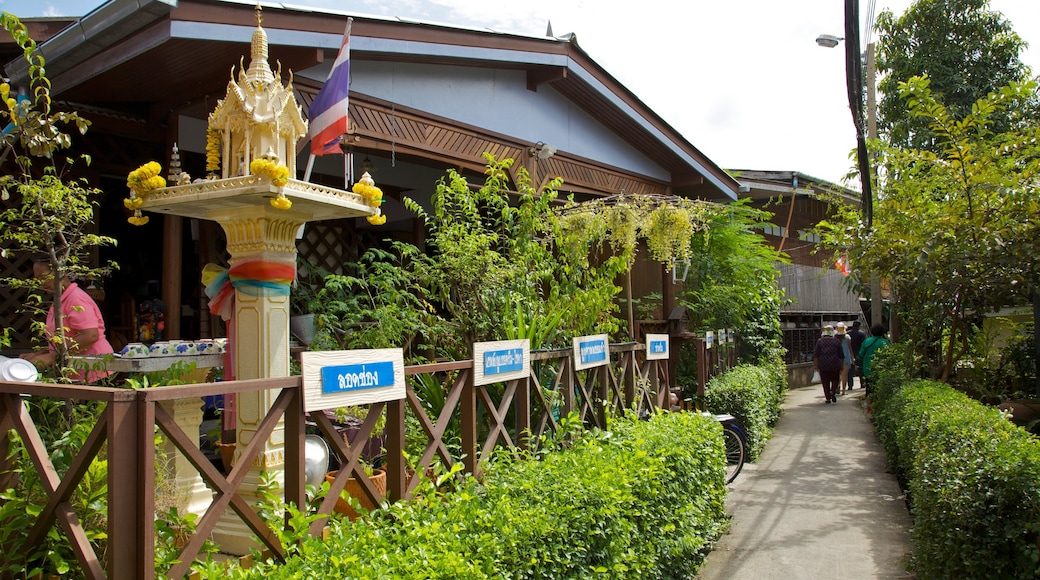 Koh Kret featuring landscape views, a temple or place of worship and a garden