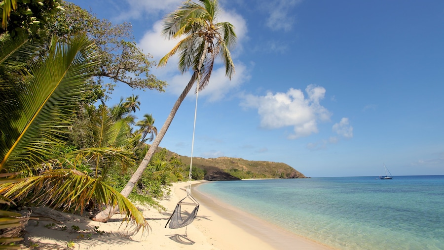 Islas Yasawas que incluye una playa de arena y escenas tropicales