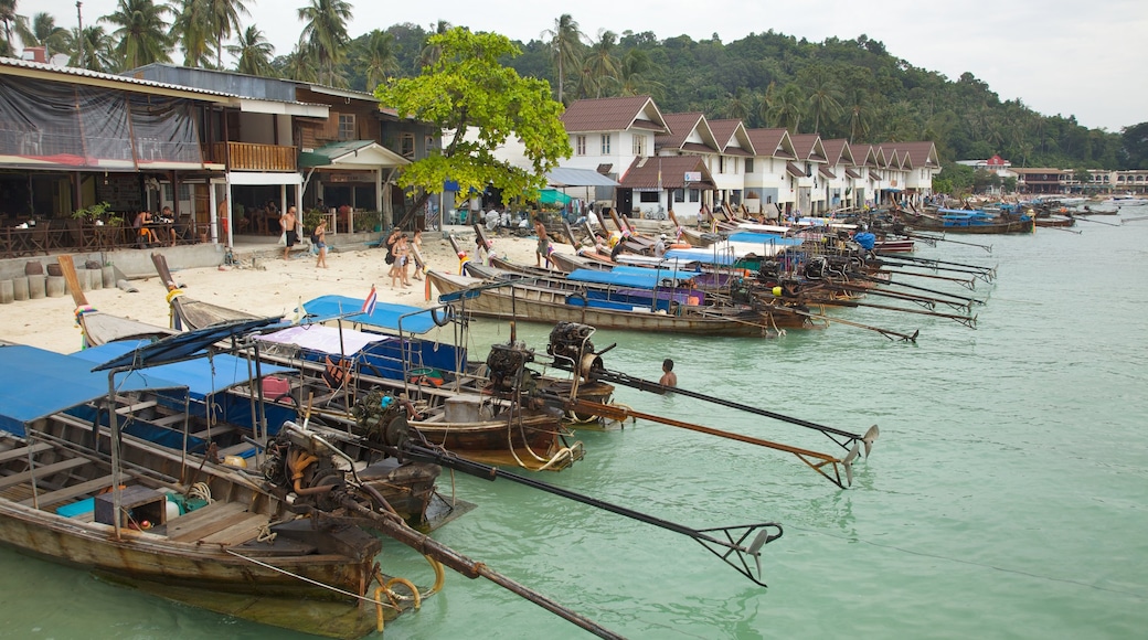 Krabi which includes tropical scenes, a coastal town and boating