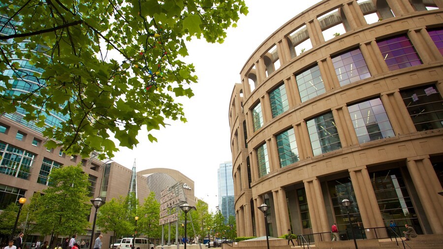 Bustling Robson Street with shops and cafes in downtown Vancouver.
