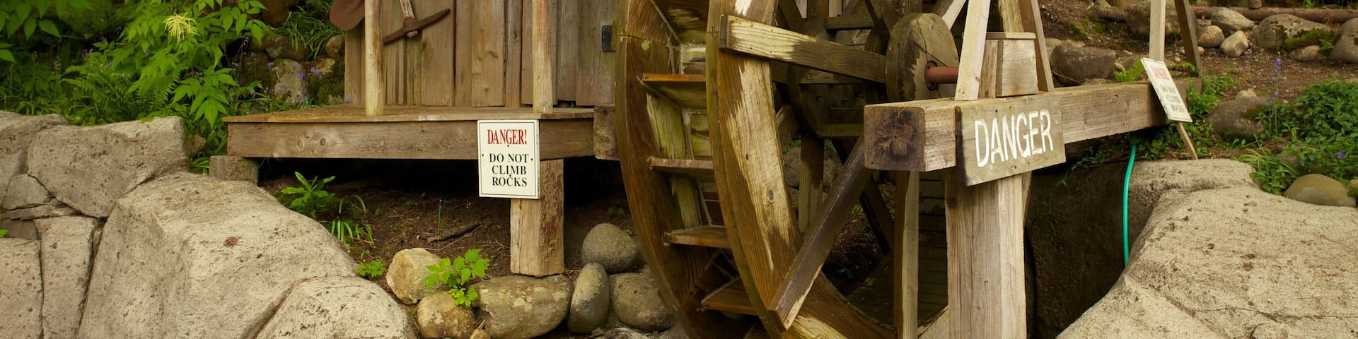 Capilano Suspension Bridge which includes landscape views and heritage architecture