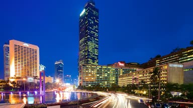 Jakarta featuring a city, a skyscraper and night scenes