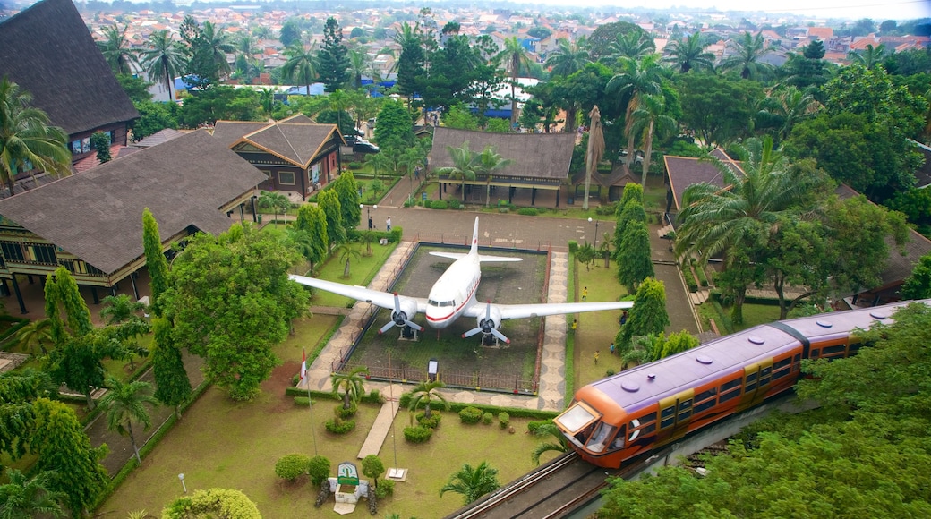 Taman Mini Indonesia Indah which includes landscape views and railway items