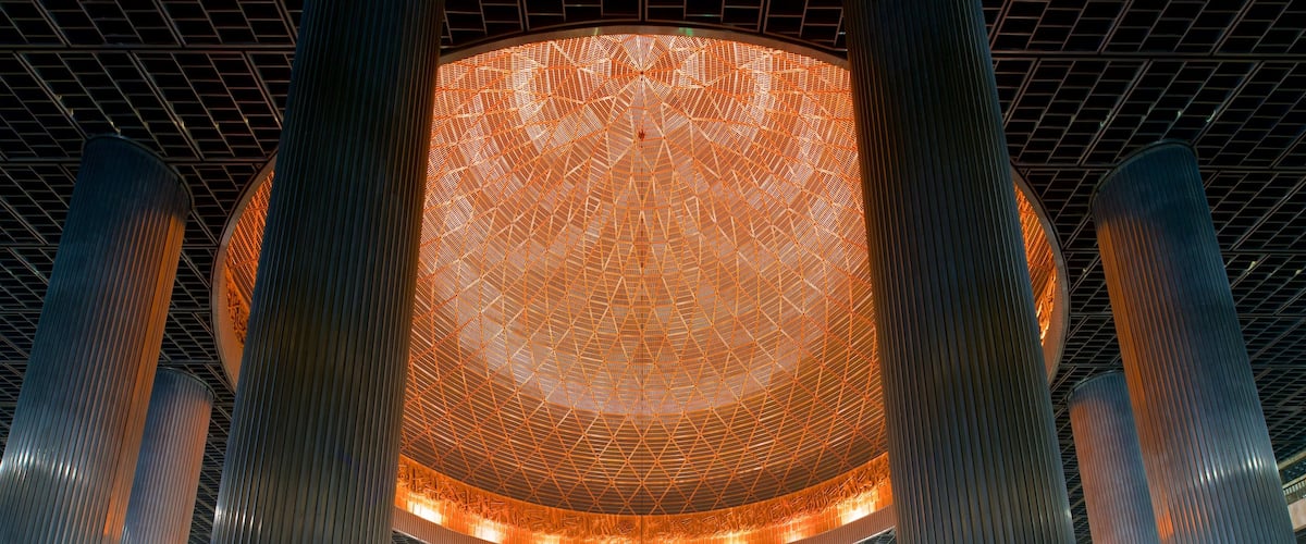 Istiqlal Mosque which includes heritage architecture and interior views
