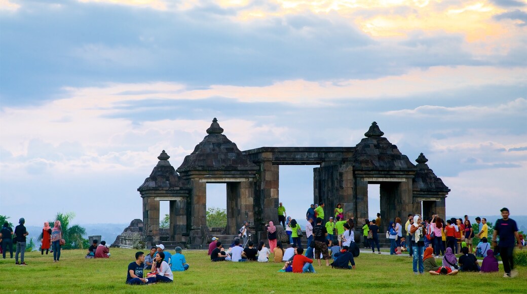 Special Region of Yogyakarta featuring picnicing, heritage elements and a sunset