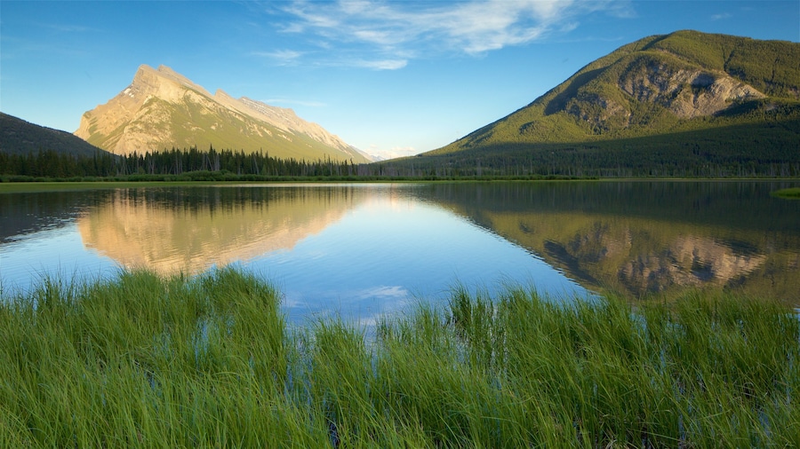 Banff featuring a lake or waterhole, wetlands and landscape views