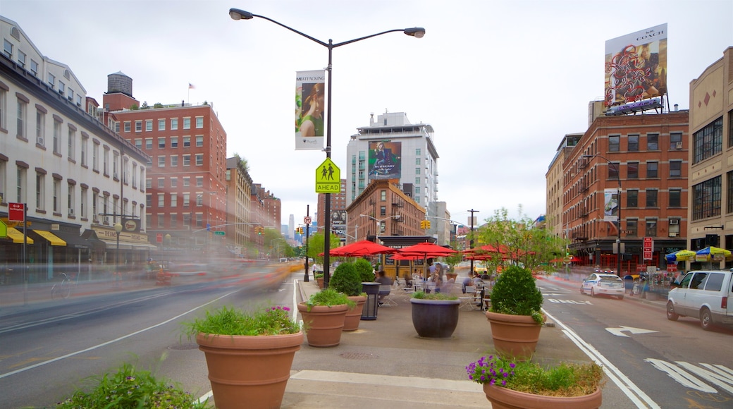 Meatpacking District showing signage, a city and flowers