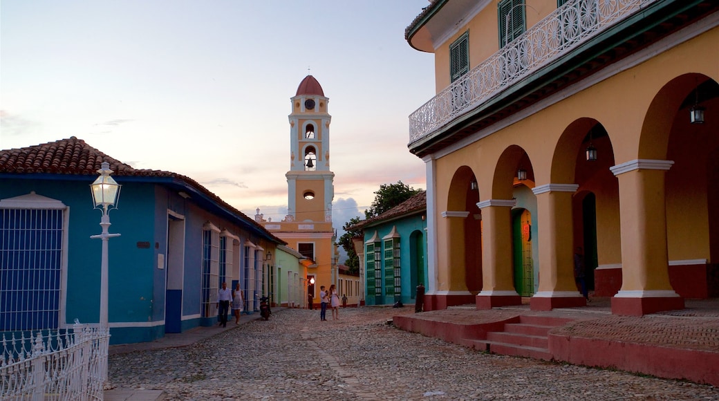 Trinidad which includes a sunset and heritage elements