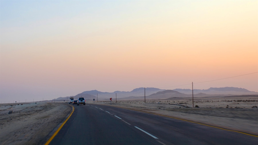 Swakopmund showing a sunset, desert views and tranquil scenes