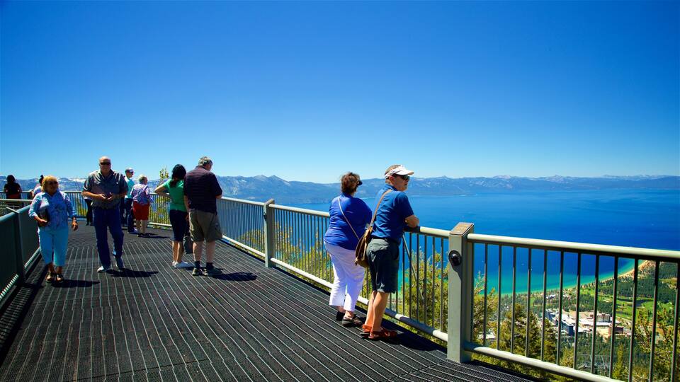 Heavenly Mountain Gondola which includes views and a lake or waterhole as well as a small group of people