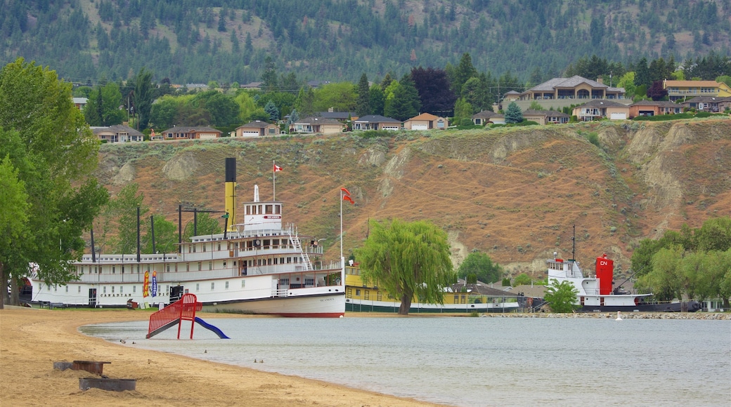 Okanagan Beach featuring a small town or village, a sandy beach and a bay or harbour