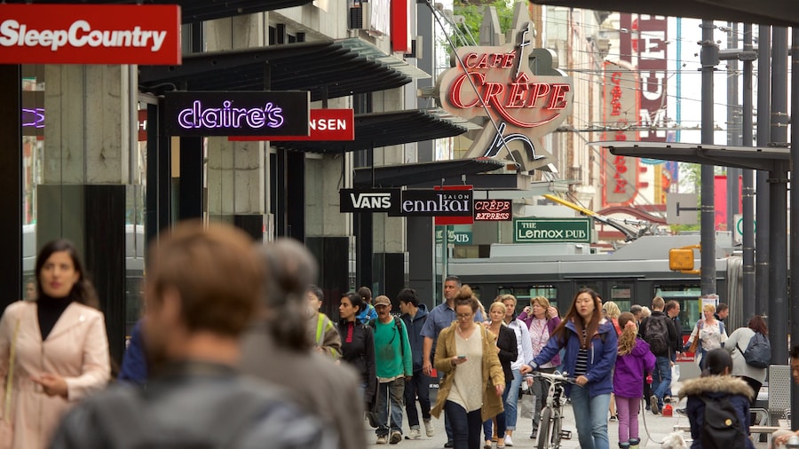 Granville Street presenterar shopping och skyltar såväl som en stor grupp av människor