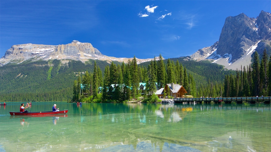 Yoho National Park showing kayaking or canoeing, mountains and a small town or village