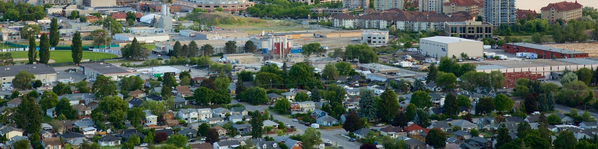 Knox Mountain Park showing a high-rise building, a city and tranquil scenes