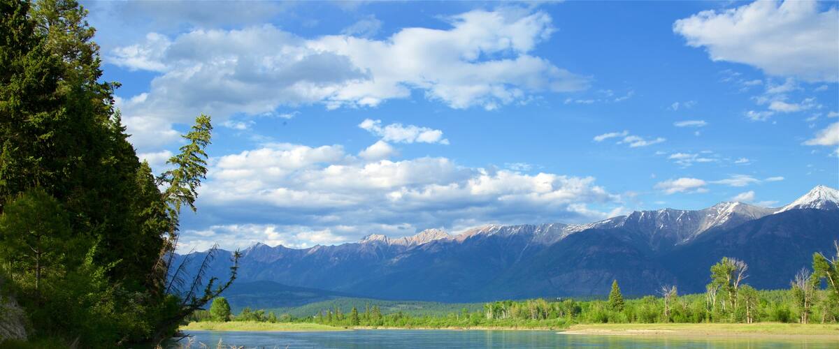 Skookumchuck which includes tranquil scenes, a lake or waterhole and mountains