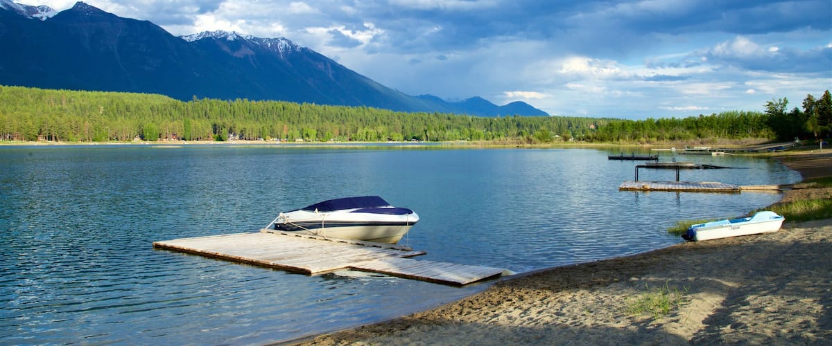 Skookumchuck which includes mountains, a lake or waterhole and tranquil scenes