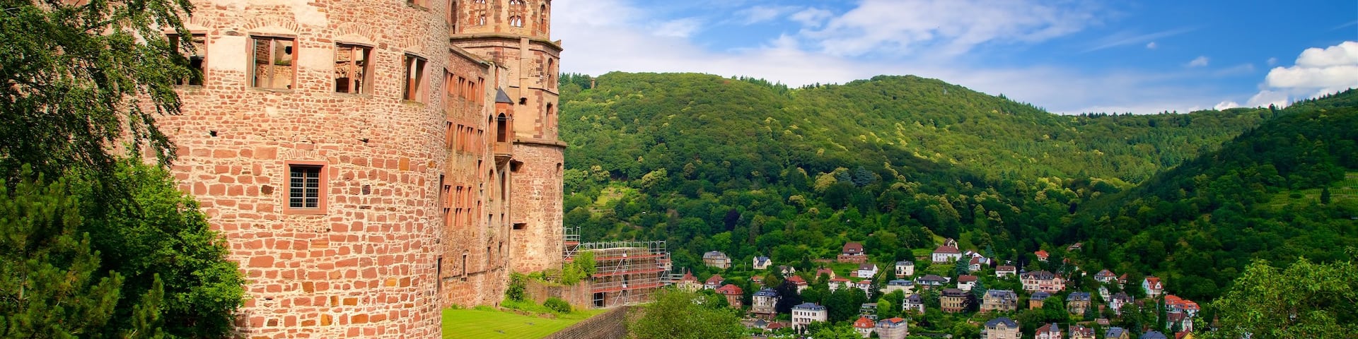Heidelberg Castle which includes heritage architecture, tranquil scenes and a small town or village
