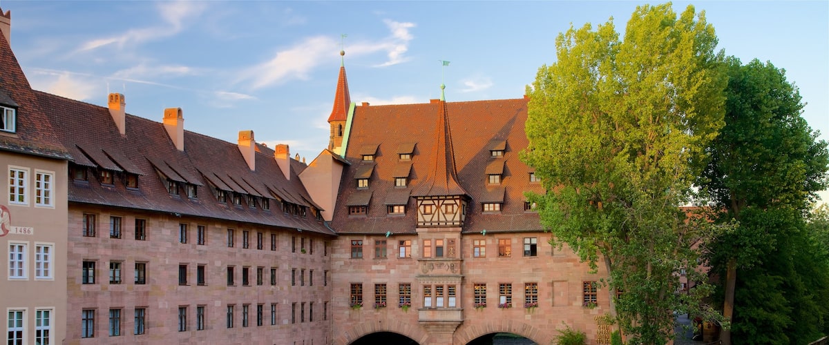 Heilig Geist Spital featuring heritage elements and a river or creek