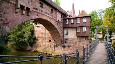 Núremberg ofreciendo elementos patrimoniales, un río o arroyo y un puente