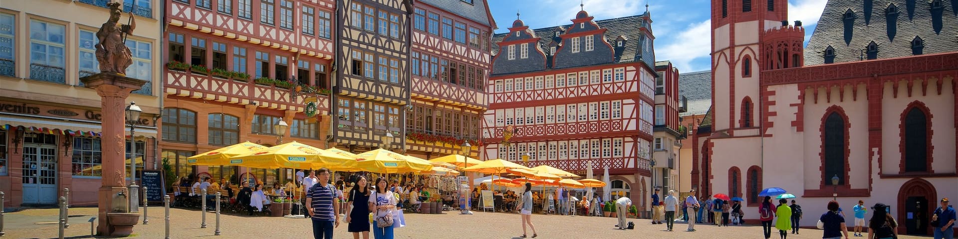 Romerplatz which includes a square or plaza, heritage elements and a statue or sculpture