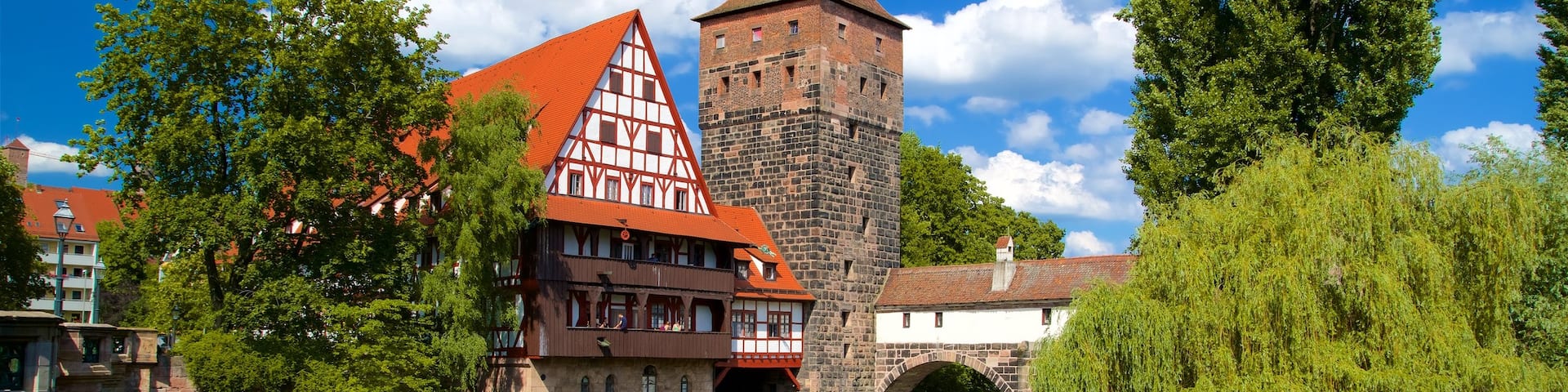 Maxbrucke which includes a bridge, a river or creek and heritage elements