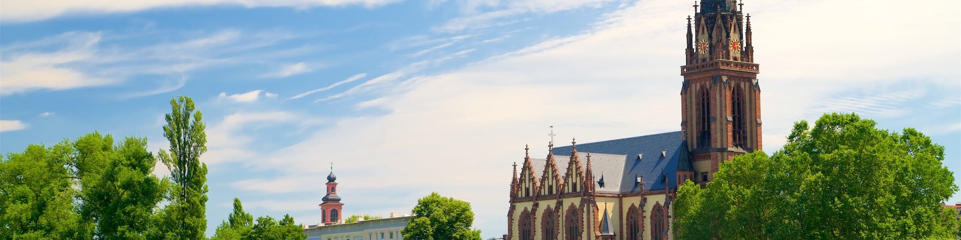 Frankfurt which includes heritage architecture, a church or cathedral and a lake or waterhole