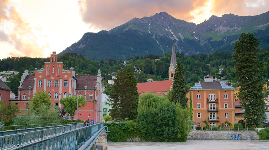 Innsbruck showing a bridge, a sunset and a river or creek