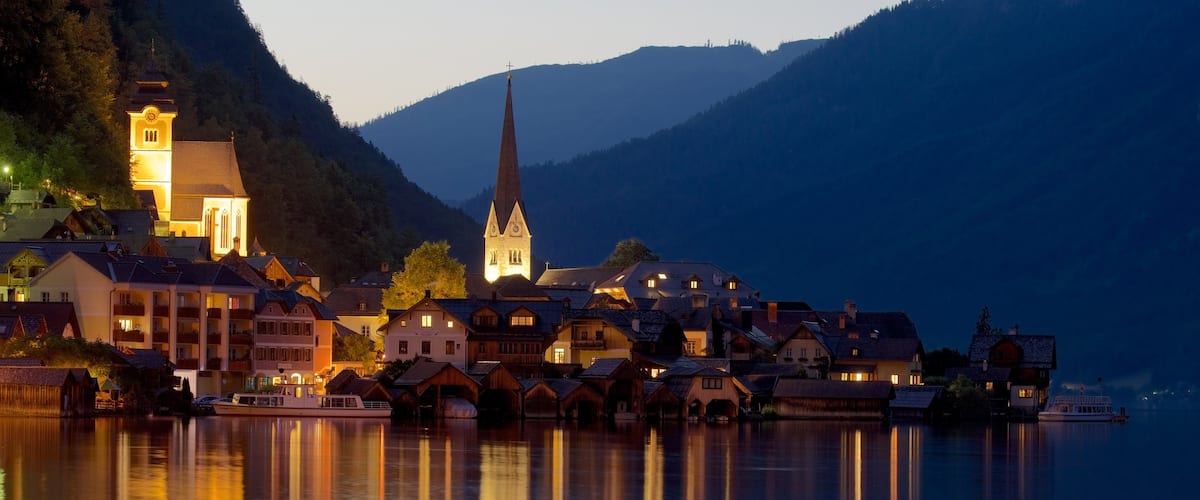 Upper Austria which includes a lake or waterhole and night scenes