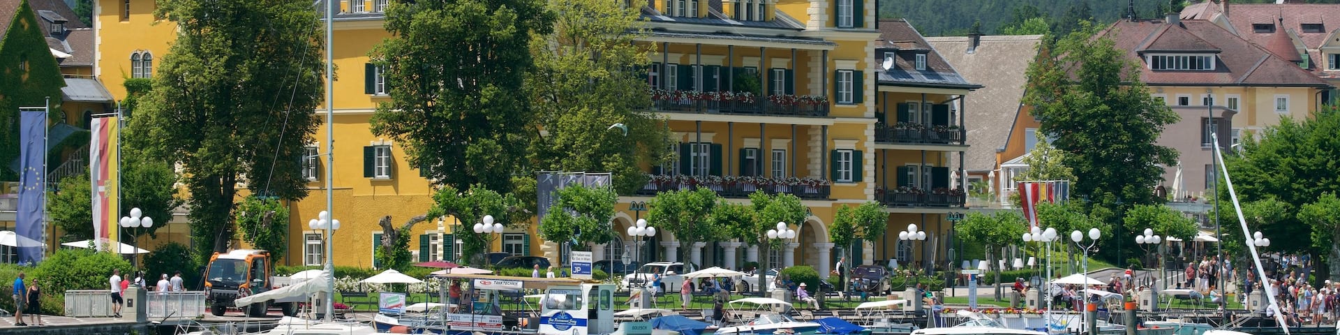 Velden am Woerthersee featuring a bay or harbor and heritage elements