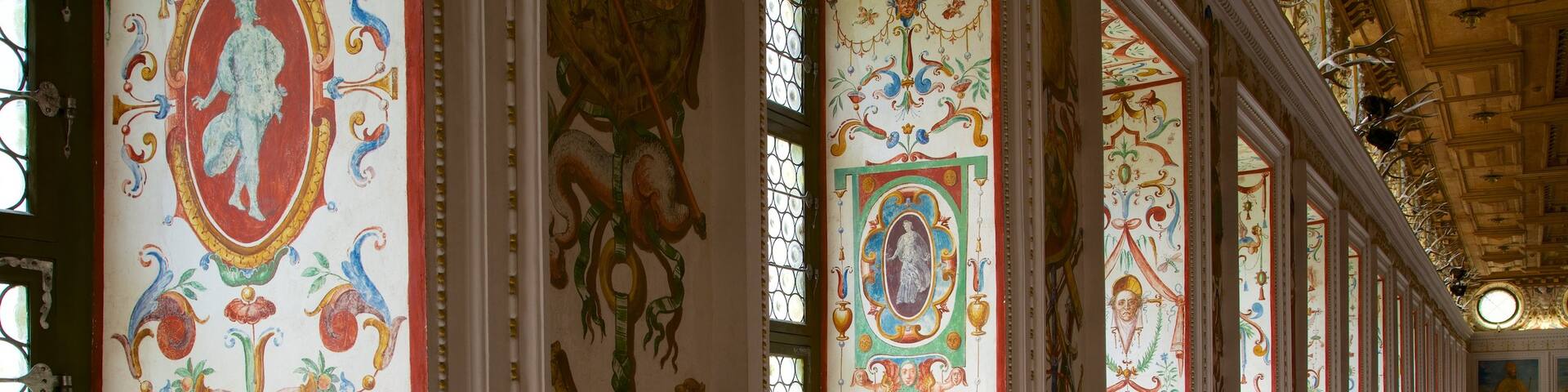 Ambras Castle featuring interior views and heritage elements