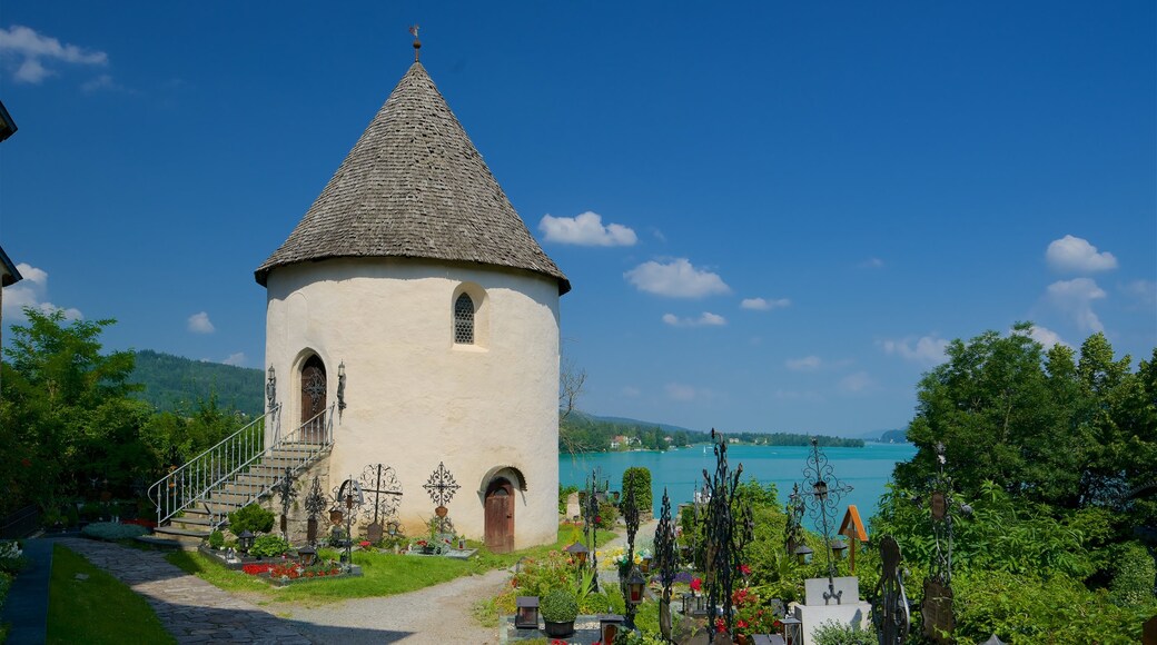 St. Primus and Felician Parish Church showing heritage elements, a cemetery and a lake or waterhole