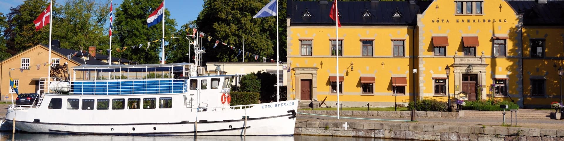 Motala featuring a river or creek, a small town or village and boating