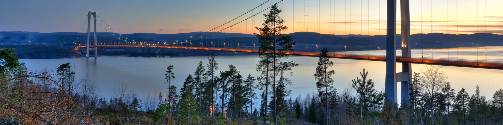 Kramfors which includes night scenes, a bridge and a river or creek
