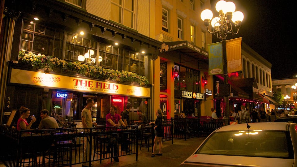 Gaslamp Quarter showing signage, night scenes and street scenes
