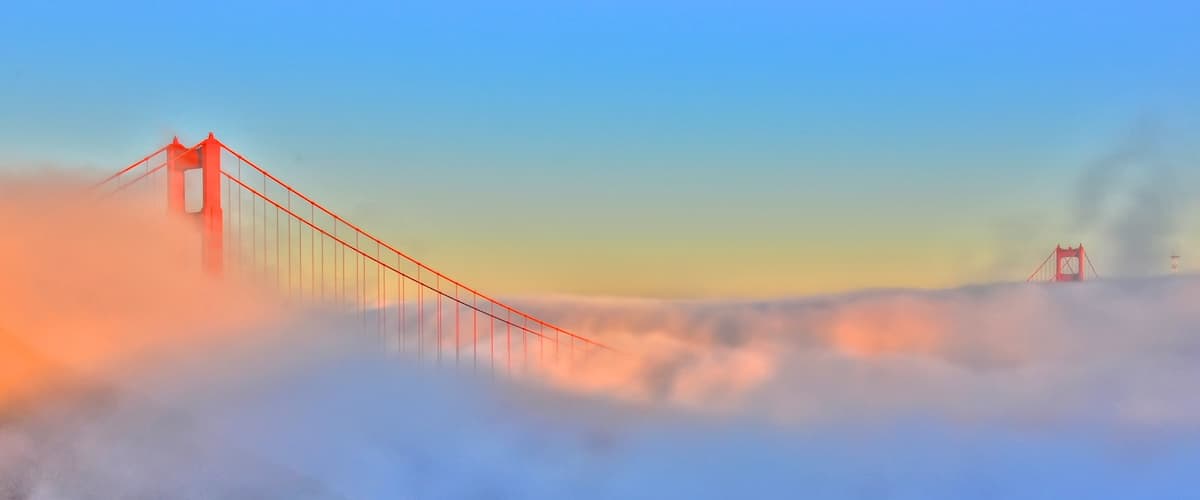Golden Gate Bridge showing a bridge and mist or fog