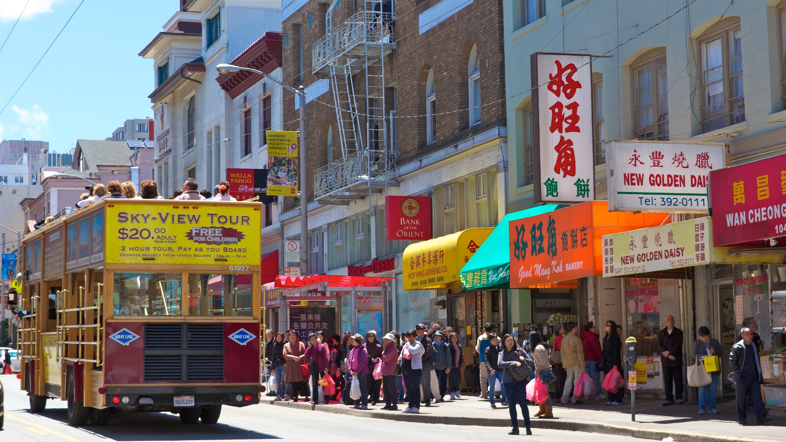 Chinatown featuring street scenes, shopping and signage