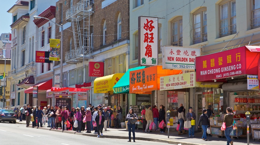Chinatown featuring signage, a city and street scenes