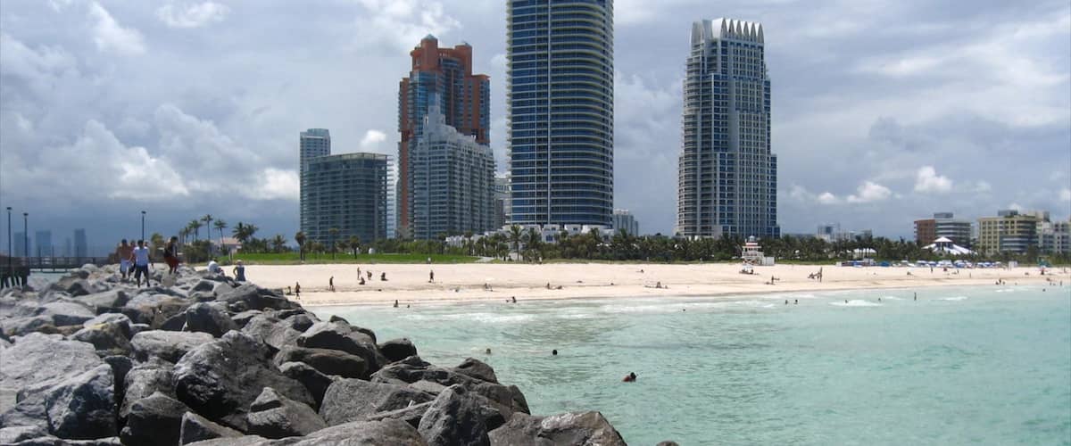 South Beach showing swimming, skyline and a sandy beach