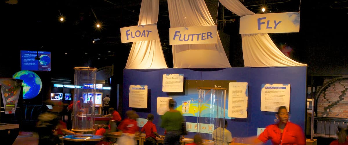 Orlando Science Center featuring interior views as well as a small group of people