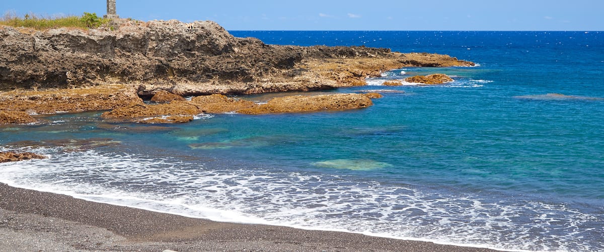Tanna Island featuring general coastal views, a pebble beach and rugged coastline