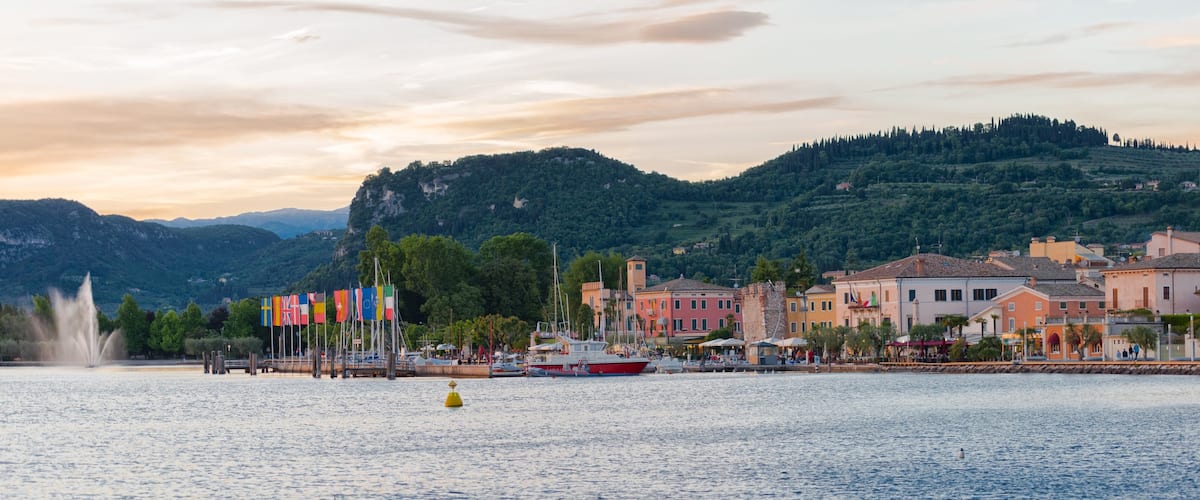 Bardolino showing a lake or waterhole and a sunset