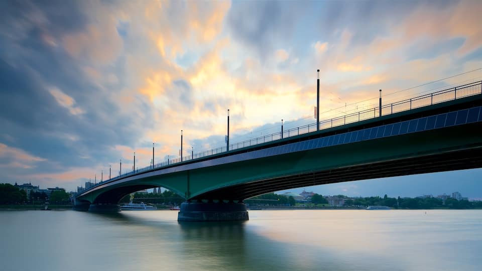 Renania Settentrionale - Vestfalia che include ponte, fiume o ruscello e tramonto