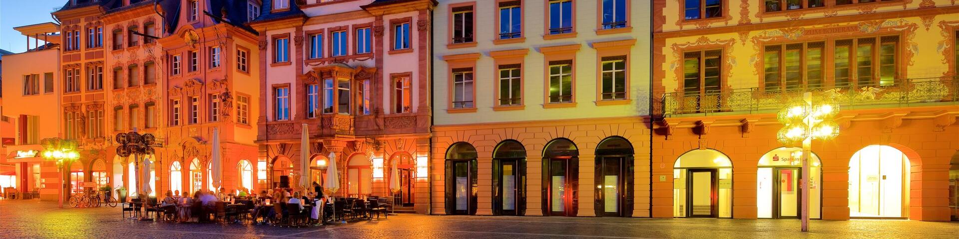 Marktbrunnen which includes heritage elements, night scenes and a square or plaza