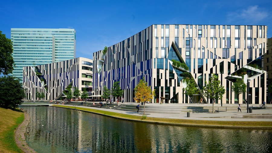 Konigsallee featuring a city, modern architecture and a river or creek