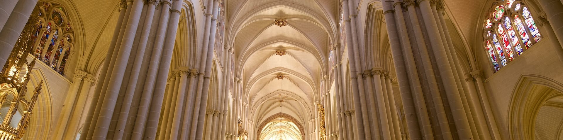 Toledo Cathedral which includes heritage elements, a church or cathedral and interior views