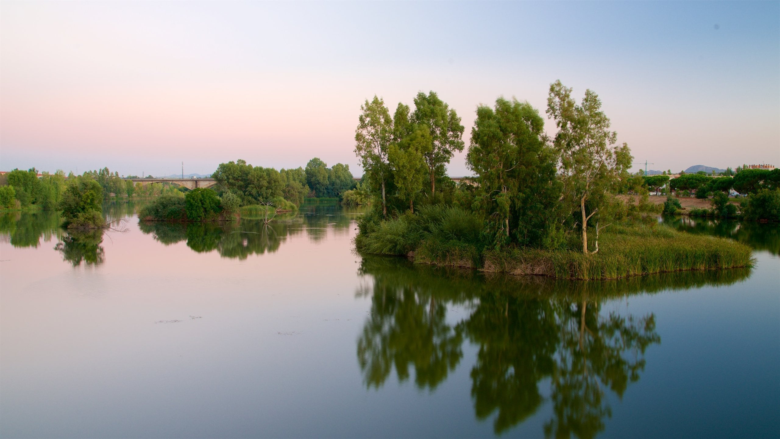 Merida showing a river or creek and a sunset